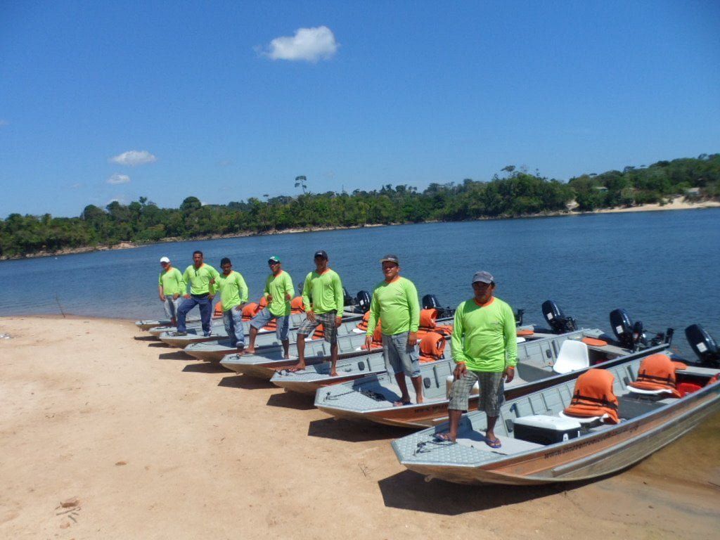 Boats lined up on the sand at the start of the day