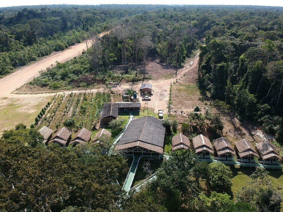 The lodge in its clearing, seen from the air