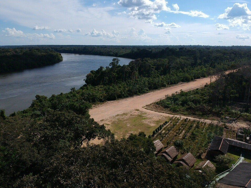 The lodge on the riverbank, seen from the air